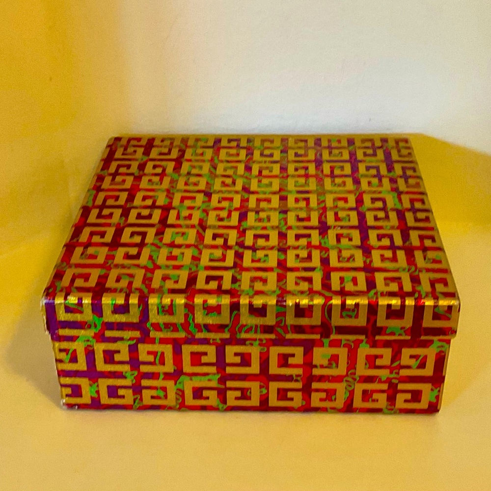 Givenchy Ysatis  is a collector's edition perfume box. An amazing, vintage